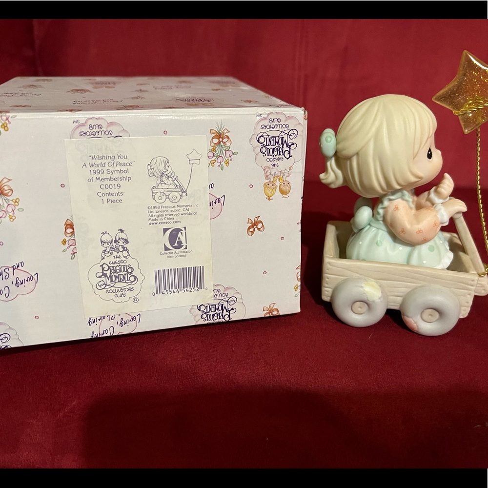 Precious Moments Wishing you a world of peace.